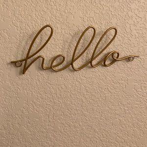 Gold "hello" wall decor from Urban Outfitters